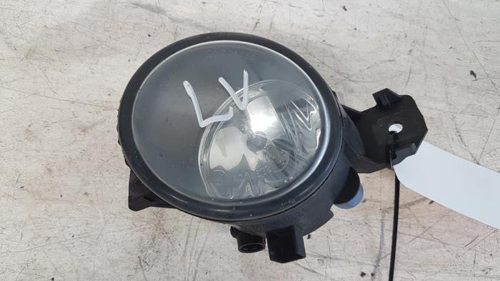 Fog light, front left from a Renault Clio III (BR/CR) 1.4 16V 2007