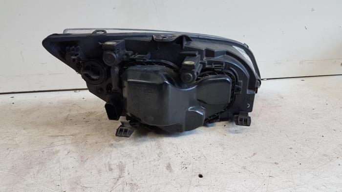 Headlight, left from a Ford Focus 2 Wagon 1.6 TDCi 16V 90 2006