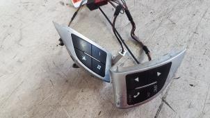 Used Steering wheel mounted radio control Fiat Punto Evo (199) 1.3 JTD Multijet 85 16V Euro 5 Price € 30,00 Margin scheme offered by Autodemontagebedrijf Smit