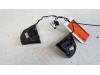 Steering wheel mounted radio control from a Opel Corsa D 1.2 16V 2008