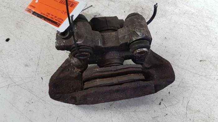 Rear brake calliper, left from a Peugeot 206 CC (2D) 2.0 16V 2002