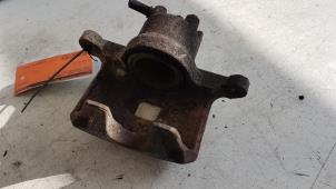 Used Front brake calliper, left Dodge Avenger (JS) 2.0 16V Price on request offered by Autodemontagebedrijf Smit