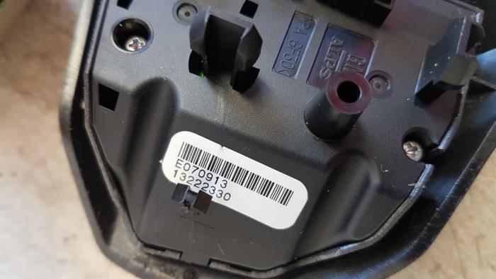 Steering wheel mounted radio control from a Opel Corsa D 1.4 16V Twinport 2008