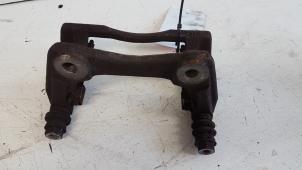 Used Front brake calliperholder, left Nissan Note (E11) 1.4 16V Price € 10,00 Margin scheme offered by Autodemontagebedrijf Smit