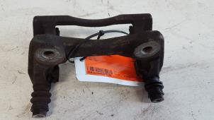 Used Front brake calliperholder, right Nissan Note (E11) 1.4 16V Price € 10,00 Margin scheme offered by Autodemontagebedrijf Smit