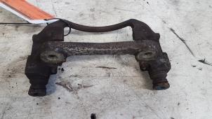 Used Front brake calliperholder, left Toyota Yaris (P1) 1.3 16V VVT-i Price € 10,00 Margin scheme offered by Autodemontagebedrijf Smit