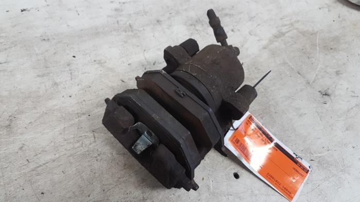 Front brake calliper, left from a Volkswagen Caddy III (2KA,2KH,2CA,2CH) 2.0 SDI 2005