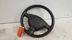 Used Steering wheel Daihatsu Cuore (L251/271/276) 1.0 12V DVVT Price € 30,00 Margin scheme offered by Autodemontagebedrijf Smit
