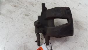 Used Front brake calliper, right Opel Corsa D 1.2 16V Price € 10,00 Margin scheme offered by Autodemontagebedrijf Smit