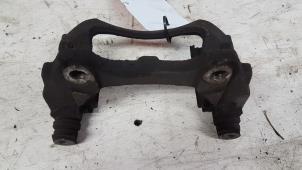 Used Front brake calliperholder, left Opel Corsa D 1.2 16V Price € 5,00 Margin scheme offered by Autodemontagebedrijf Smit