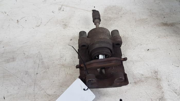 Rear brake calliper, left from a BMW 3 serie (E90) 325i 24V 2005