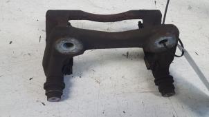 Used Front brake calliperholder, left Nissan Micra (K12) 1.2 16V Price € 5,00 Margin scheme offered by Autodemontagebedrijf Smit