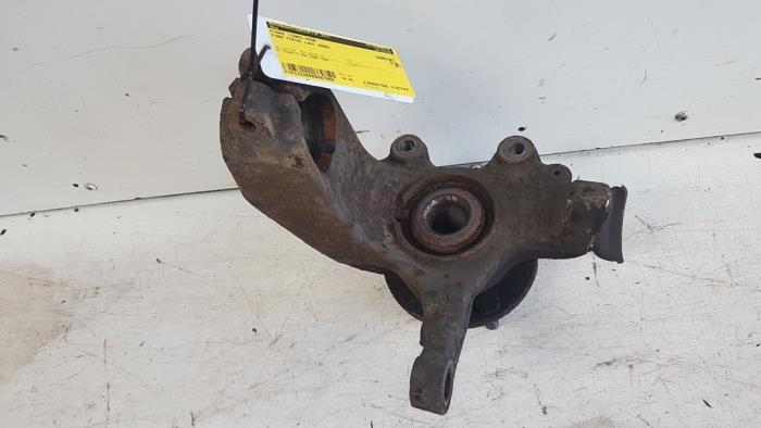 Knuckle, front left from a Ford Focus 2 Wagon 1.6 16V 2006