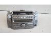 Radio/Lecteur CD d'un Daihatsu Sirion 2 (M3), 2005 1.0 12V DVVT, Berline avec hayon arrière, Essence, 998cc, 51kW (69pk), FWD, 1KRFE, 2005-01 / 2013-06, M300 2008