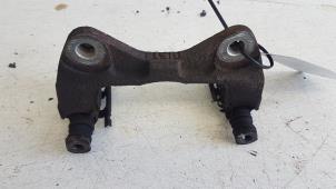 Used Front brake calliperholder, left Daihatsu Sirion 2 (M3) 1.0 12V DVVT Price € 10,00 Margin scheme offered by Autodemontagebedrijf Smit