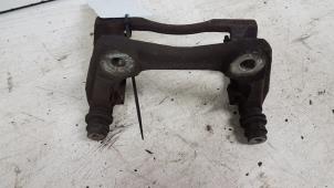 Used Front brake calliperholder, left Nissan Note (E11) 1.6 16V Price € 10,00 Margin scheme offered by Autodemontagebedrijf Smit