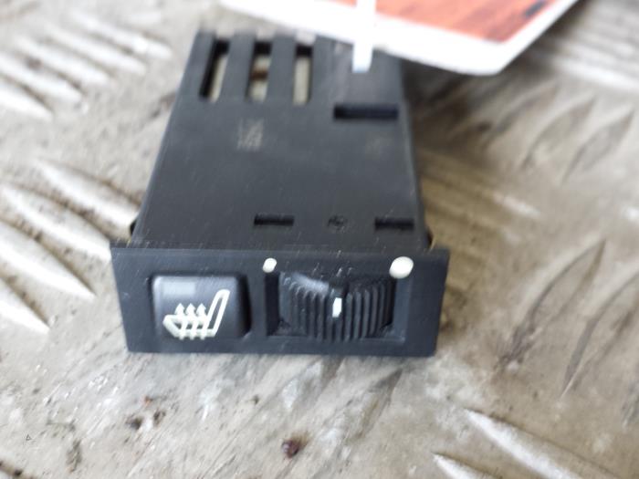 Seat heating switch
