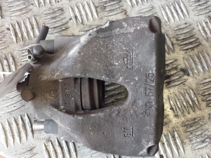 Front brake calliper, left from a Opel Zafira (F75) 1.8 16V 2000