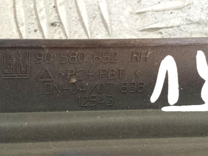 Headlight trim, right from a Opel Zafira (F75) 1.8 16V 2001