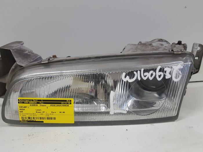Używane Reflektor lewy Mazda 626 (GE12/72/82) 1.8i LX/GLX 16V Cena € 30,00 Procedura marży oferowane przez Autodemontagebedrijf Smit