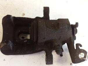 Used Rear brake calliper, left Renault Scénic I (JA) 2.0 16V Price € 25,00 Margin scheme offered by Autodemontagebedrijf Smit