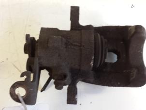 Used Rear brake calliper, right Renault Scénic I (JA) 2.0 16V Price € 25,00 Margin scheme offered by Autodemontagebedrijf Smit