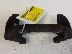 Used Front brake calliperholder, left Ford Ka I 1.3i Price € 10,00 Margin scheme offered by Autodemontagebedrijf Smit