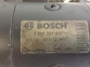 Anlasser van een Nissan Vanette (C23) 2.3 D E/Cargo 2002