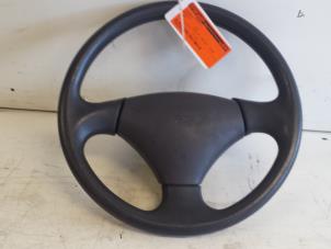 Used Steering wheel Daihatsu Cuore (L251/271/276) 850,Domino Price € 70,00 Margin scheme offered by Autodemontagebedrijf Smit