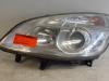 Headlight, left from a Renault Grand Scénic II (JM) 2.0 16V 2007