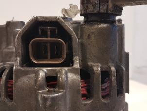 Dynamo van een Mazda 323 (BJ12) 2.0DTiD 2002