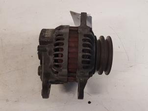 Dynamo van een Mazda 323 (BJ12) 2.0DTiD 2002