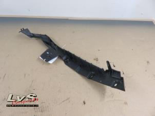 Used Headlight frame, left Opel Astra J (PC6/PD6/PE6/PF6) Price on request offered by LvS Carparts