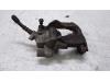 Front brake calliper, right from a Renault Twingo III (AH) 1.0 SCe 70 12V 2016