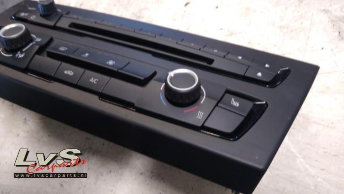 Panel de control de calefacción de un BMW 1 serie (F20) 114i 1.6 16V 2014