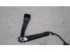 Seatbelt tensioner, left from a BMW 1 serie (E88) 120i 16V 2008
