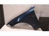 Front wing, left from a BMW 1 serie (F20) 118d 2.0 16V 2011