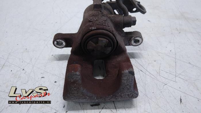 Rear brake calliper, left from a Kia Venga 1.4 CVVT 16V 2011