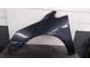 Front wing, left from a Opel Astra J Sports Tourer (PD8/PE8/PF8), 2010 / 2015 1.4 16V ecoFLEX, Combi/o, Petrol, 1.398cc, 74kW (101pk), FWD, A14XER; B14XER, 2010-10 / 2015-10 2011