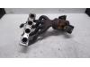 Exhaust manifold + catalyst from a BMW 3 serie (E90) 316i 16V 2009