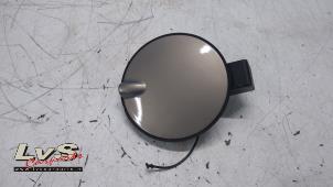 Used Tank cap cover Opel Corsa D 1.2 16V Price € 15,00 Margin scheme offered by LvS Carparts