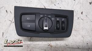 Used Light switch BMW 3 serie Touring (F31) 320d 2.0 16V Price € 20,00 Margin scheme offered by LvS Carparts