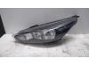 Headlight, left from a Ford Focus 3 Wagon 2.0 TDCi 16V 150 2016