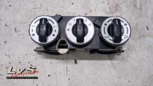 Usados Panel de control de calefacción Mitsubishi Colt (Z2/Z3) 1.1 12V Precio € 20,00 Norma de margen ofrecido por LvS Carparts