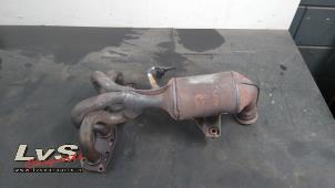 Used Exhaust manifold + catalyst Peugeot 208 I (CA/CC/CK/CL) 1.4 16V Price € 225,00 Margin scheme offered by LvS Carparts