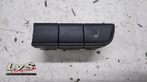 Usados Interruptor de calefactor de asiento Audi A1 Sportback (8XA/8XF) 1.0 TFSI Ultra 12V Precio € 15,00 Norma de margen ofrecido por LvS Carparts