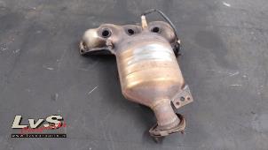 Used Exhaust manifold + catalyst Opel Tigra Twin Top 1.4 16V Price € 175,00 Margin scheme offered by LvS Carparts