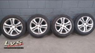 Used Set of wheels + tyres Peugeot 208 I (CA/CC/CK/CL) 1.4 16V Price € 200,00 Margin scheme offered by LvS Carparts