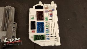 Engine management computer from a Opel Astra L Sports Tourer (F4/FC/FN/FR) 1.6 Plug-in Hybrid Turbo 16V 2023