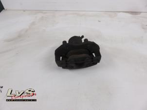 Used Front brake calliper, right Ford Focus 2 Wagon 1.6 TDCi 16V 110 Price € 32,00 Margin scheme offered by LvS Carparts
